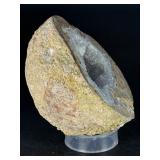 Natural Quartz Agate “Galaxy” Geode is a mesmerizing geological treasure that resembles a miniature cosmic landscape.