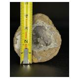 Natural Quartz Agate “Galaxy” Geode is a mesmerizing geological treasure that resembles a miniature cosmic landscape.