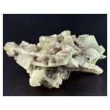 Laguna Lace Agate (Partial Polished) is a striking natural piece that beautifully balances raw texture with smooth, polished detail.