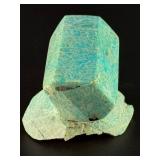 Amazonite Hand-Carved Chunk is a beautifully sculpted crystal piece that highlights the soothing blue-green tones and natural striations of amazonite.