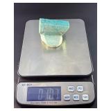 Amazonite Hand-Carved Chunk is a beautifully sculpted crystal piece that highlights the soothing blue-green tones and natural striations of amazonite.