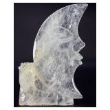 Hand-Carved Moon with Rose is a beautifully detailed crystal carving that blends celestial symbolism with gentle, heart-centered beauty. Shaped into a graceful crescent moon and adorned with a delicat