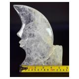 Hand-Carved Moon with Rose is a beautifully detailed crystal carving that blends celestial symbolism with gentle, heart-centered beauty. Shaped into a graceful crescent moon and adorned with a delicat