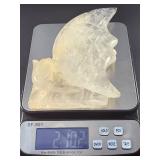 Hand-Carved Moon with Rose is a beautifully detailed crystal carving that blends celestial symbolism with gentle, heart-centered beauty. Shaped into a graceful crescent moon and adorned with a delicat