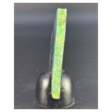 Rainbow Fluorite Slab is a stunning, polished slice that showcases fluorite’s signature bands of purple, green, blue, and soft teal hues.