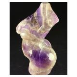 Divine Feminine Amethyst Chevron is a beautifully patterned crystal that combines the deep purple of amethyst with milky white quartz in distinctive V-shaped chevron banding.