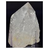 Quartz Point - Golden Healer is a striking crystal featuring clear quartz accented with subtle golden tones from natural iron inclusions, known as Golden Healer.