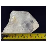 Quartz Point - Golden Healer is a striking crystal featuring clear quartz accented with subtle golden tones from natural iron inclusions, known as Golden Healer.