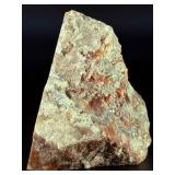 Crazy Lace Agate is a vibrant and eye-catching crystal known for its intricate, swirling patterns and lively mix of colors, typically including creamy whites, warm reds, oranges, and browns.