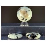 Rainbow Moonstone Sphere and Palm Stones are enchanting pieces that showcase the soft, luminous glow and signature flashes of rainbow sheen unique to rainbow moonstone.