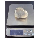 Natural Clear Quartz Puffy Heart with inclusions is a charming, hand-polished crystal carved into a soft, rounded heart shape.