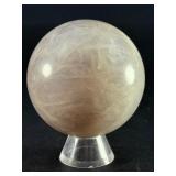 Blue Quartz Sphere is a polished crystal sphere that showcases the calming, ethereal beauty of blue quartz.