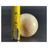 Blue Quartz Sphere is a polished crystal sphere that showcases the calming, ethereal beauty of blue quartz.