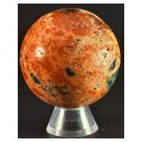 Sunstone and Blue Apatite Sphere is a striking crystal sphere that combines the warm, radiant energy of sunstone with the calming, deep blue tones of apatite.