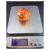 Sunstone and Blue Apatite Sphere is a striking crystal sphere that combines the warm, radiant energy of sunstone with the calming, deep blue tones of apatite.