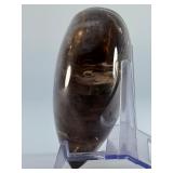 Large Smoky Quartz Heart with Rainbows & Inclusions is a striking, hand-polished crystal heart. The rich, earthy tones of smoky quartz along with natural internal inclusions that create captivatin