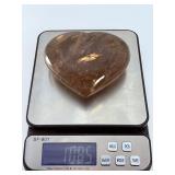 Large Smoky Quartz Heart with Rainbows & Inclusions is a striking, hand-polished crystal heart. The rich, earthy tones of smoky quartz along with natural internal inclusions that create captivatin