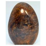 Brown Quartzite Freeform is a naturally shaped, polished stone that highlights the earthy, warm tones and subtle striations of quartzite.