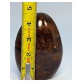 Brown Quartzite Freeform is a naturally shaped, polished stone that highlights the earthy, warm tones and subtle striations of quartzite.