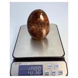 Brown Quartzite Freeform is a naturally shaped, polished stone that highlights the earthy, warm tones and subtle striations of quartzite.