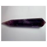 Extra Large Amethyst Vogel Double Terminated is a powerful and visually striking crystal, expertly carved into the iconic Vogel shape with pointed terminations at both ends.