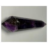 Extra Large Amethyst Vogel Double Terminated is a powerful and visually striking crystal, expertly carved into the iconic Vogel shape with pointed terminations at both ends.