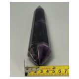 Extra Large Amethyst Vogel Double Terminated is a powerful and visually striking crystal, expertly carved into the iconic Vogel shape with pointed terminations at both ends.
