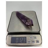 Extra Large Amethyst Vogel Double Terminated is a powerful and visually striking crystal, expertly carved into the iconic Vogel shape with pointed terminations at both ends.