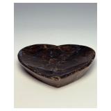 Arfvedsonite Heart Dish is a beautifully hand-carved crystal dish shaped like a heart, showcasing the deep, inky blue-black tones and striking natural patterns of arfvedsonite.