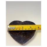 Arfvedsonite Heart Dish is a beautifully hand-carved crystal dish shaped like a heart, showcasing the deep, inky blue-black tones and striking natural patterns of arfvedsonite.