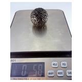 Chiseled Obsidian Sphere is a bold and captivating crystal sphere sculpted from natural obsidian. Its smooth, polished surface is enhanced with subtle chiseled facets, creating depth, texture, and a d