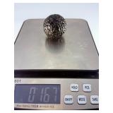 Chiseled Obsidian Sphere is a bold and captivating crystal sphere sculpted from natural obsidian. Its smooth, polished surface is enhanced with subtle chiseled facets, creating depth, texture, and a d