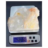 A radiant Golden Healer quartz that shimmers with warm, honey-gold hues and soft natural phantoms.  with custom wooden stand from Brazil