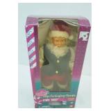 Gemmy Hip Swinging Santa Doll. North Pole Productions