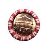 Three rolls of uncirculated pennies: one is 2024-D mint, and the other two are unknown (Shield out).
