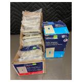 Box of 10 Leviton Ivory Nylon Midway Wallplates and box of Plastic wallplates.