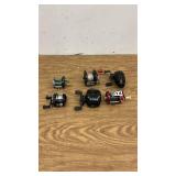 Collection of 6 Fishing Reels including Penn, Shakespeare, and Abu Garcia