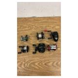 Collection of 6 Fishing Reels including Penn, Shakespeare, and Abu Garcia