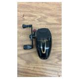 Collection of 6 Fishing Reels including Penn, Shakespeare, and Abu Garcia