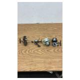 Set of 4 Vintage Fishing Reels Including Heddon and Omega 144XL