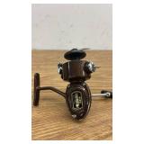 Set of 4 Vintage Fishing Reels Including Heddon and Omega 144XL