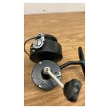 Set of 4 Vintage Fishing Reels Including Heddon and Omega 144XL