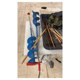 Ice Fishing Lot with Manual Auger, Gear, Wooden Fish Hook Rack, Net, and Fillet Knife