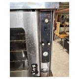 Heavy-duty commercial convection ovens in a stacked configuration