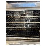 Heavy-duty commercial convection ovens in a stacked configuration