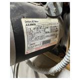 Heavy-duty commercial convection ovens in a stacked configuration