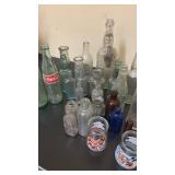 Collection of Vintage Glass Bottles and Welch