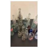 Collection of Vintage Glass Bottles and Welch
