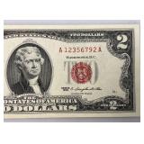 2 Dollar Bill From 1963 With Red Seal And Red Numbers (Very Good Condition) In Protective Sleeve)