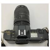 Vintage Cannon T-70 Camera With Extra Lense